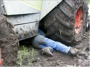 veiligheid storingen machines man onder tractor